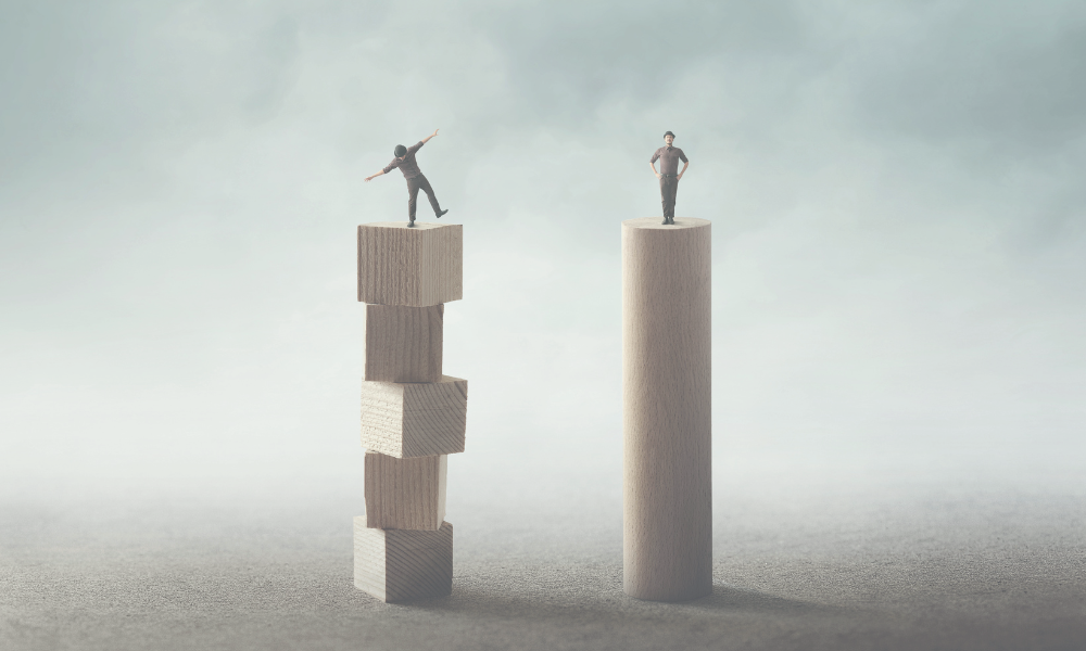 A person standing on an unstable tower next to a person standing firmly on a stable tower. The graphic symbolizes how Enterprise Architecture Supports Operational Consistency and Stability